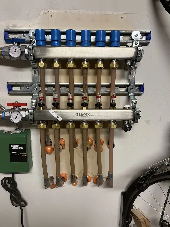 Plumber performing Water Heater Repair at a residential property in Pennsbury